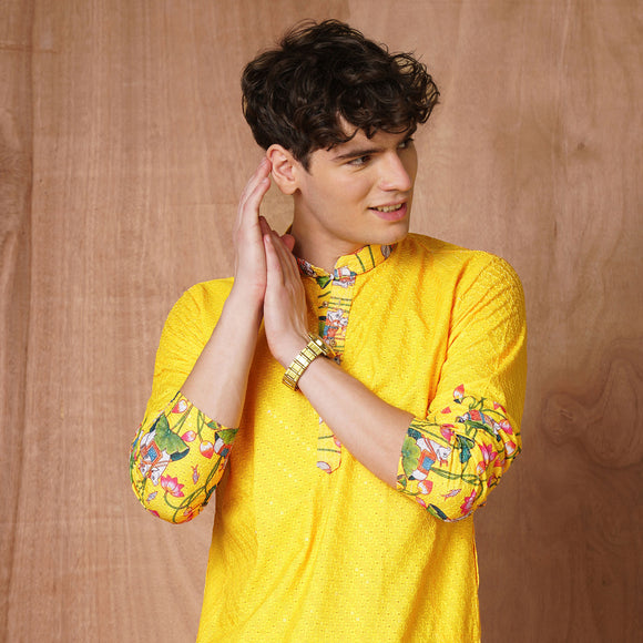 Close-up of sleeve and collar on Men’s Yellow Floral Kurta showing colorful floral detailing and festive texture.