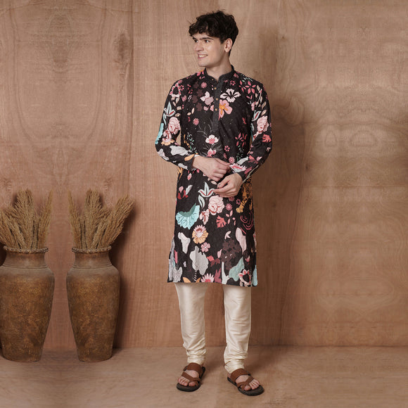 Full front view of men’s black designer kurta with multicolor floral and tiger print, suited for traditional and ceremonial wear.