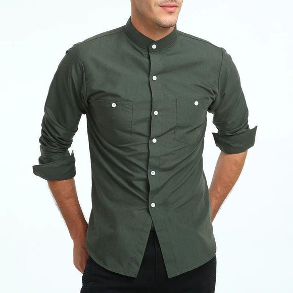 a man wearing a green shirt and black pants