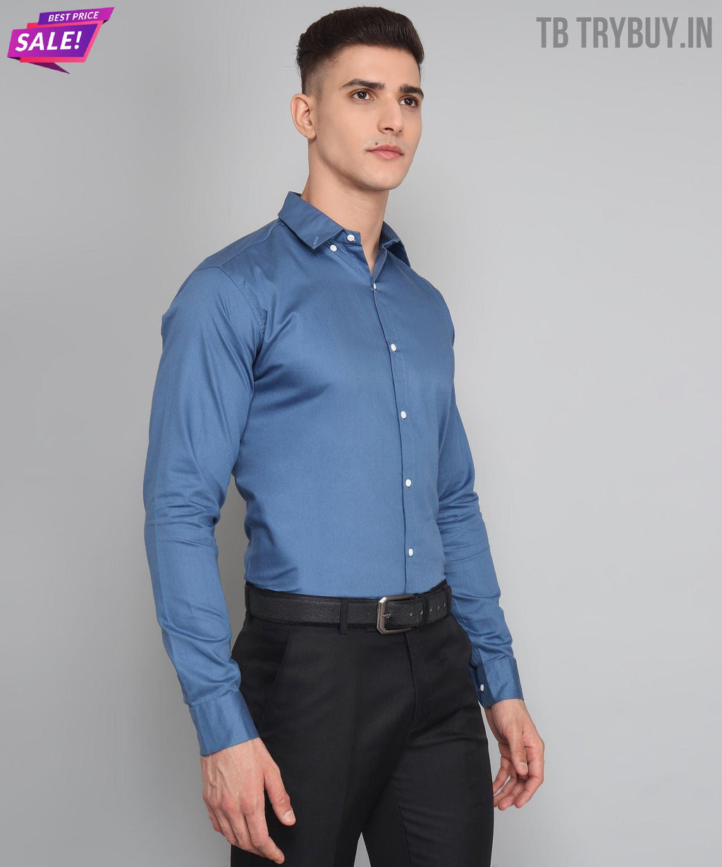 a man wearing a blue shirt and black pants