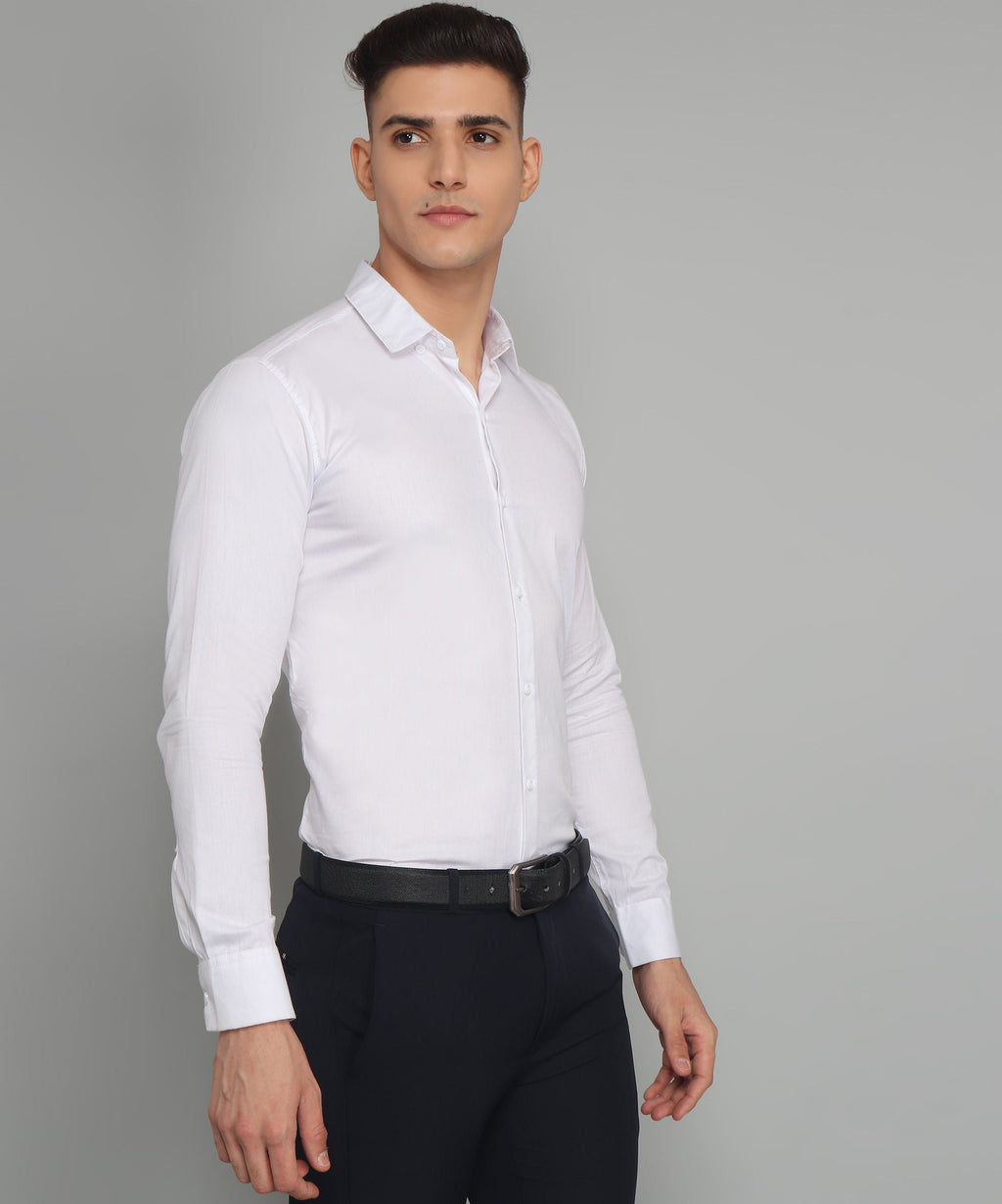 a man wearing a white shirt and black pants