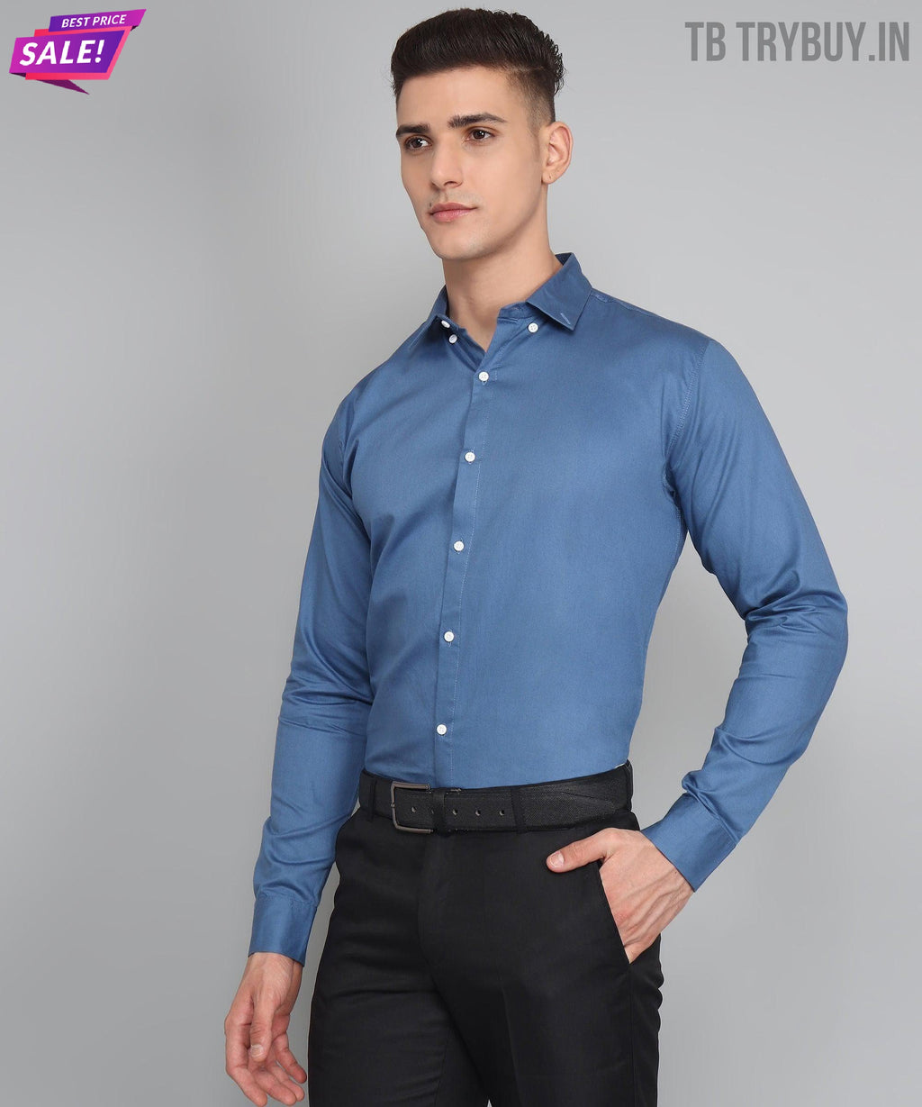 a man wearing a blue shirt and black pants