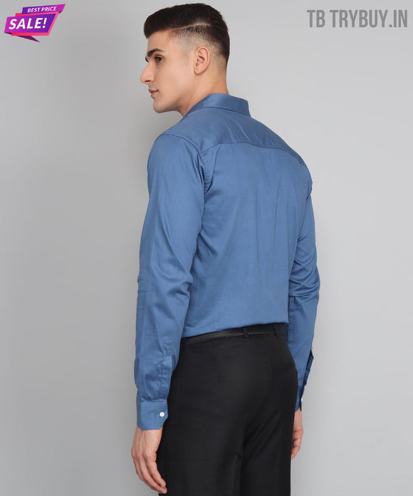 a man wearing a blue shirt and black pants