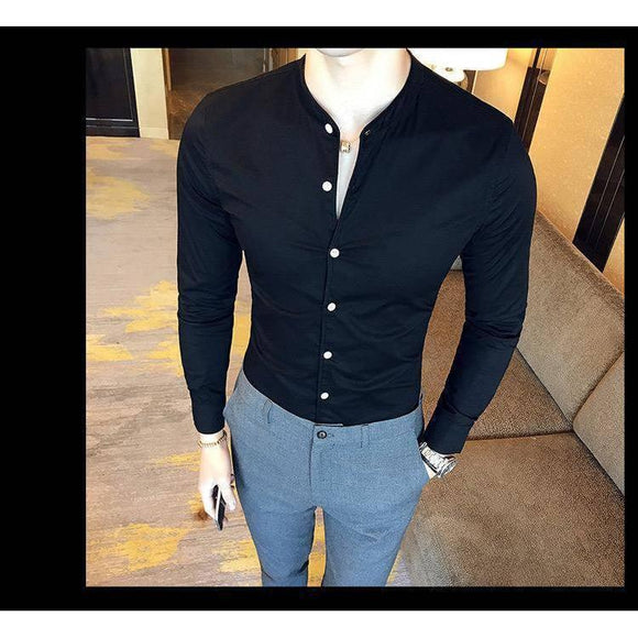 a mannequin wearing a black shirt and blue pants