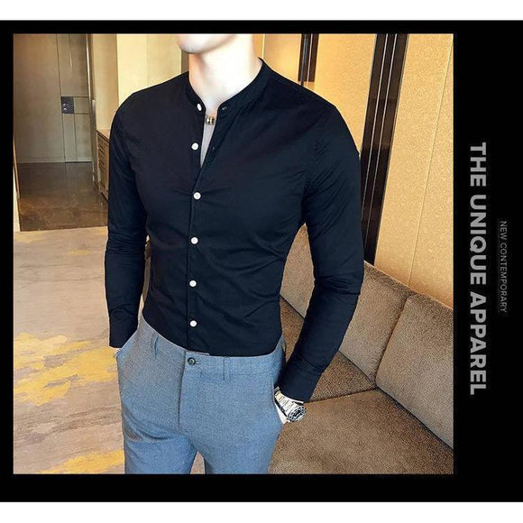 a mannequin wearing a black shirt and grey pants