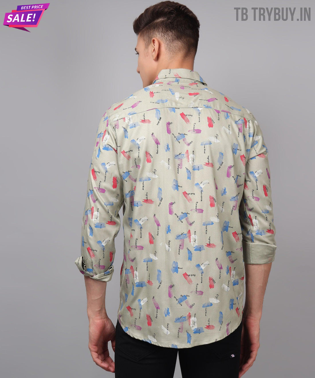 
a man wearing a shirt with a pattern on it
