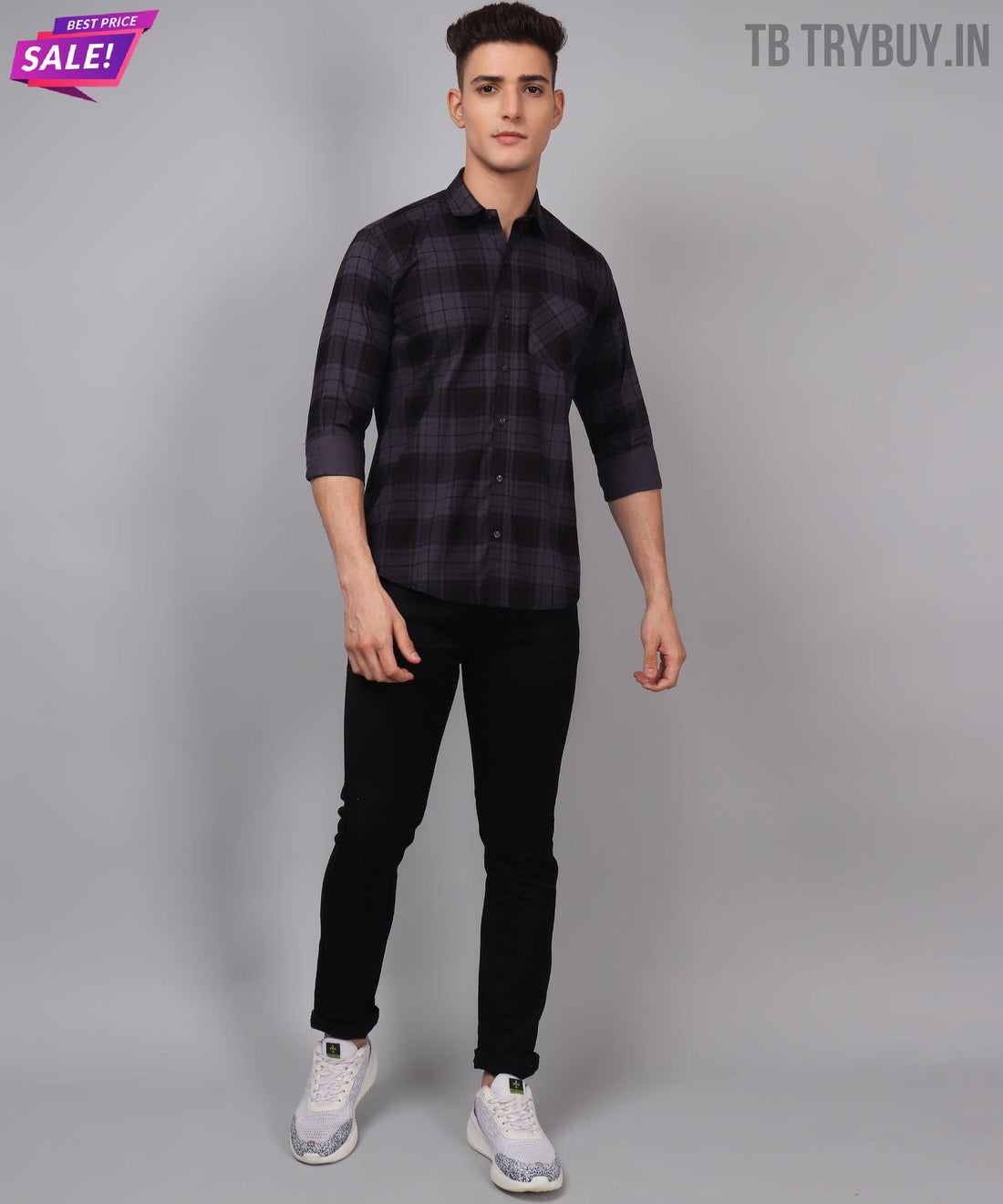 a man in a black and grey checkered shirt