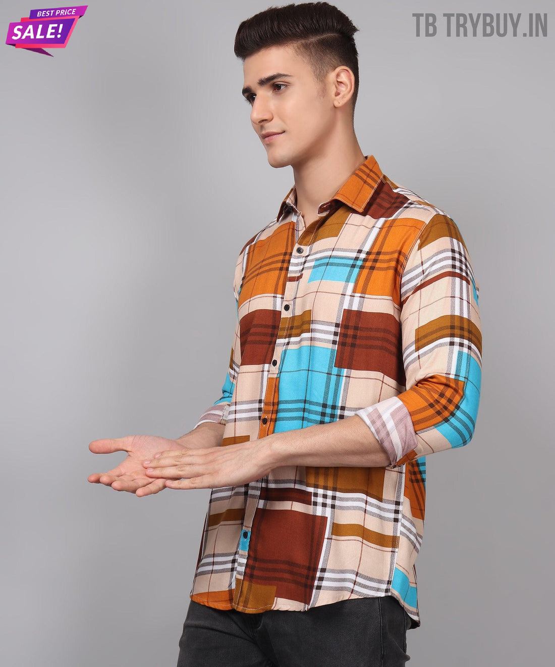 
a man in a plaid shirt is holding his hands out
