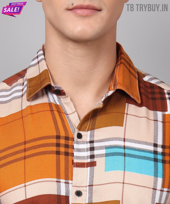 a man wearing a plaid shirt and glasses