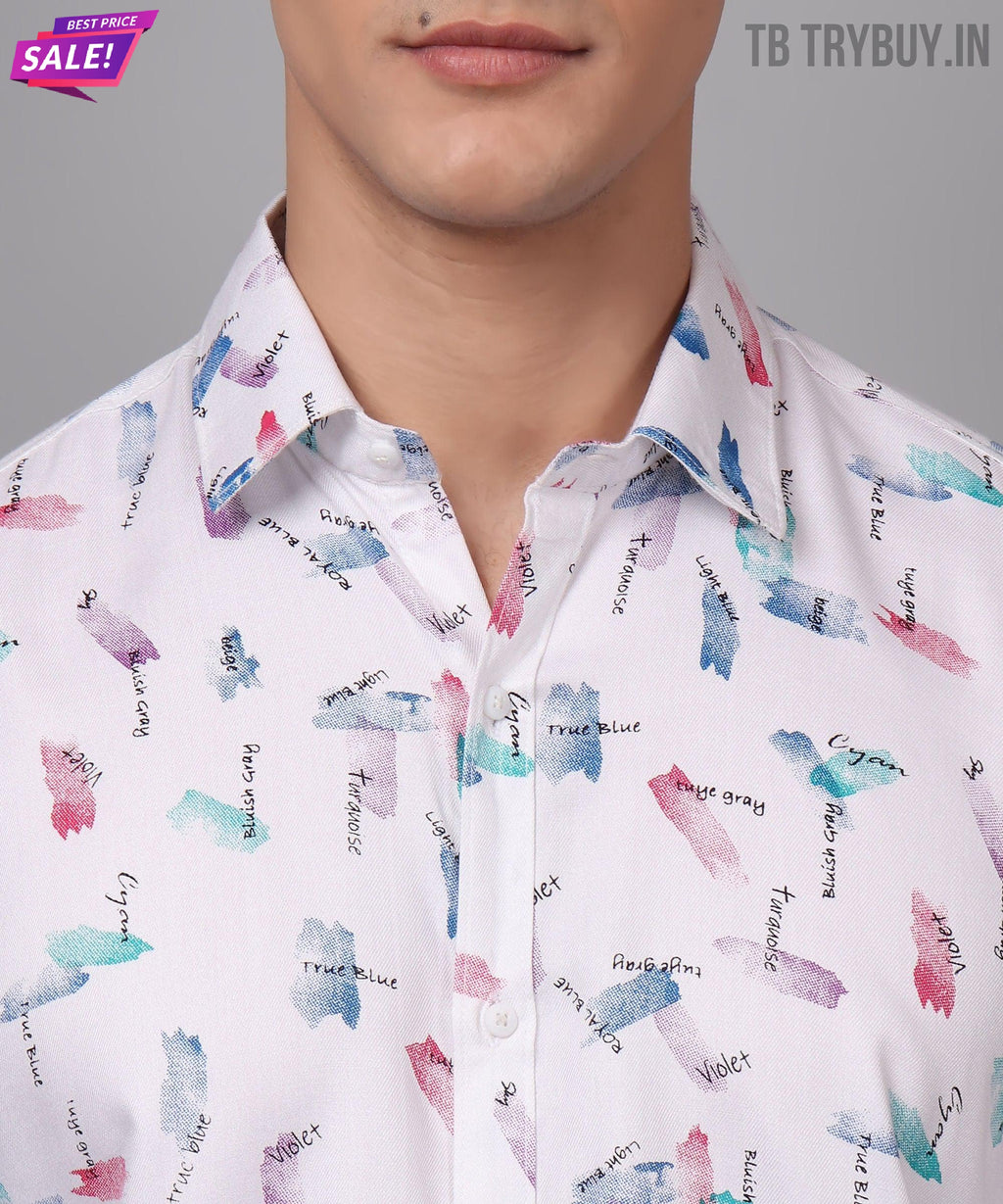 a man wearing a white shirt with a colorful pattern on it