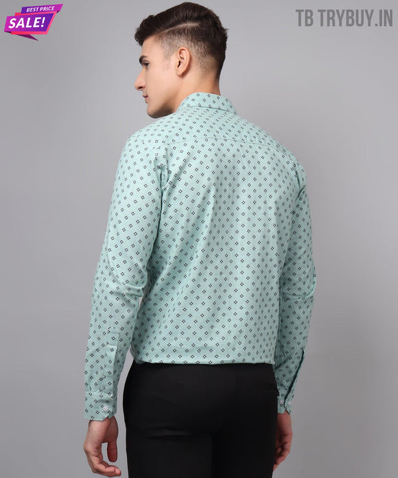 a man in a green shirt and black pants