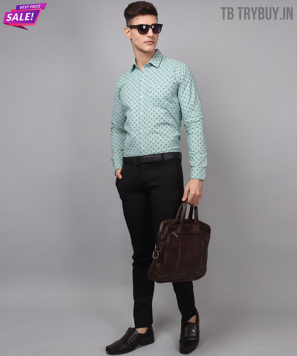 a man in a green shirt and black pants holding a brown bag