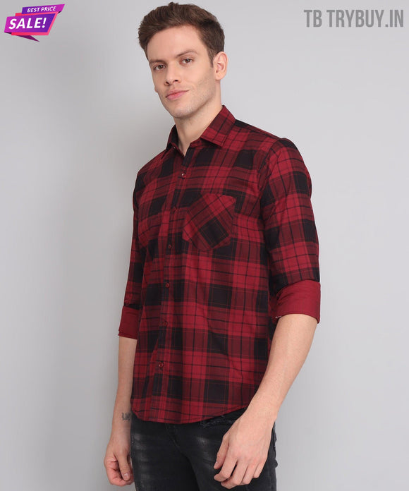 a man wearing a red and black plaid shirt