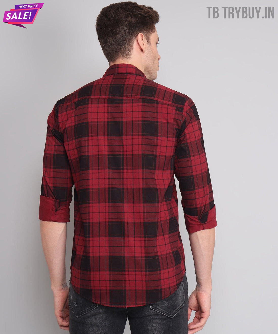 a man wearing a red and black plaid shirt
