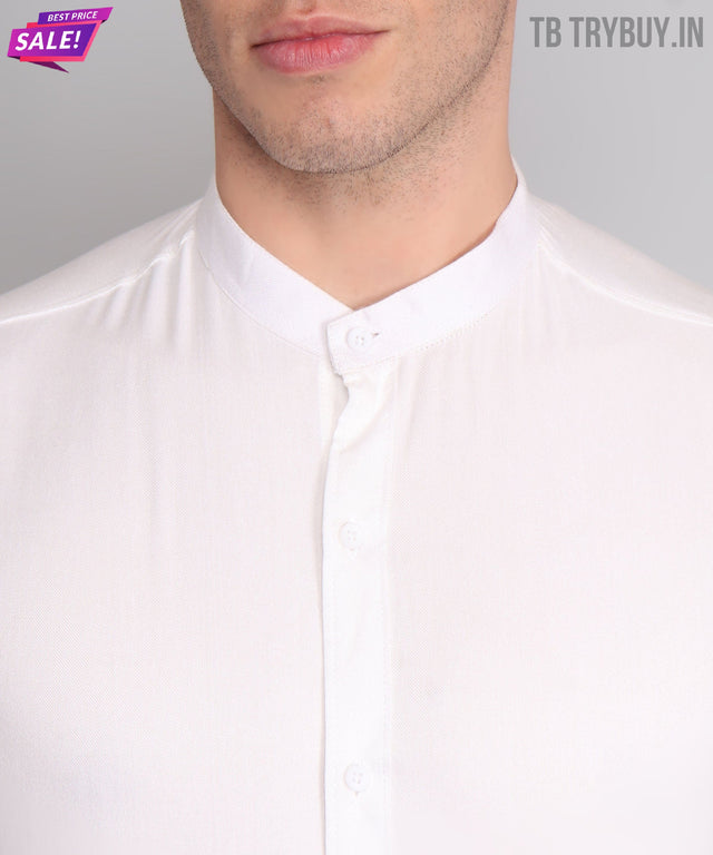 
a man wearing a white shirt and glasses
