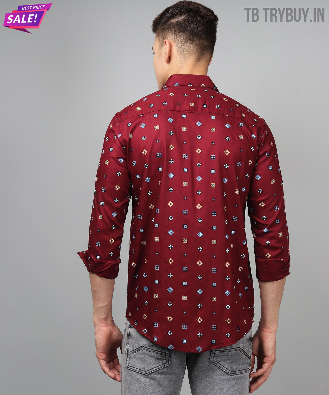 a man wearing a red shirt with blue and yellow squares on it