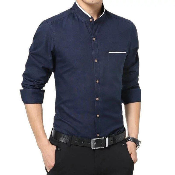 a man wearing a blue shirt and black pants