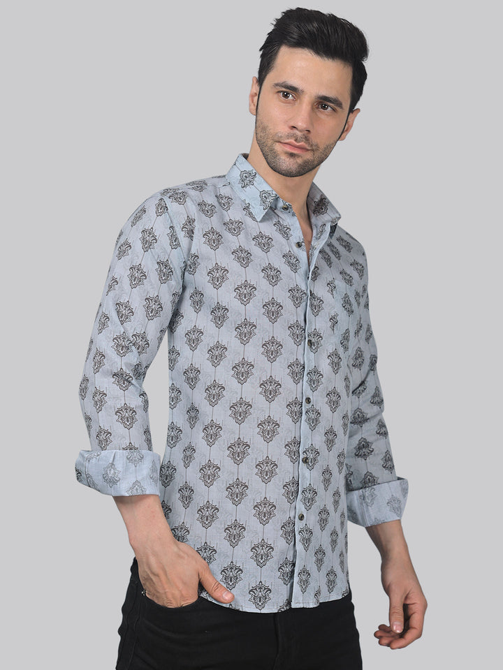 a man wearing a shirt with a pattern on it